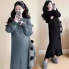 Ropa de maternidad otoño e invierno holgada de moda nuevo estilo purpurina fina engrosado temperamento adelgazante suéter de punto dulce de moda falda de cola de pez