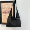 Bolso de axila texturizado estilo coreano, 2026 de moda y a la moda para mujer, bolso de hombro simple y de gran capacidad, bolso de mano casual
