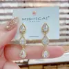 Pendientes de moda estilo coreano, simples, con circonita en forma de gota de agua para mujer, diseño de nicho, elegantes, para celebridades de internet, para ir al trabajo, accesorios versátiles para las orejas
