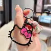 Nueva cadena de llaves de aleación de gato KT con pintura hueca, linda decoración de bolsa de chica de dibujos animados, colgante para llavero de coche