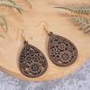 Aretes de madera más vendidos de comercio electrónico transfronterizo, moda europea y americana, aretes de madera geométricos huecos exagerados hechos a mano