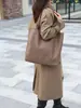 Bolso tote nuevo de gran capacidad para mujer 2026, con diseño de cuero estampado de lichi, un elegante bolso de hombro y un aspecto versátil de alta gama adecuado para el trabajo.