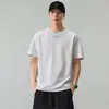 Camiseta de Verano 2026 de Manga Corta y Cuello Redondo Negra Blanca Beige Corte Holgado Con Etiqueta Sin Cuello