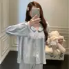 Nuevos pijamas de doble cara de terciopelo de isla para otoño para mujer, nuevo diseño de encaje de color liso de manga larga y pantalón largo con cuello de muñeca para casa, estilo dulce
