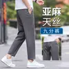 Pantalones casuales de lino cortos para primavera y verano para hombre, pantalones de Tencel de nueve puntos, pantalones finos de verano, pantalones holgados de pierna recta para hombres menudos