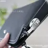 Bolso de Mano Largo para Hombre W Baolong de Piel de Vaca Negra con Grano, Logo de Joyería, Simple, Combinable