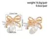 Joyería transfronteriza europea y americana dulce lazo de cinta Aretes de lazo aretes stud de perla sintética simples de nicho para mujer