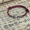 Ins pulsera de león sacudidor estilo Tíbet todo a juego cuerda color vino tinto tejida a mano simple pulsera de la suerte estilo chino