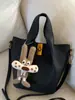 Bolso Cubo Retro para Mujer 2025 Invierno Nuevo Bolso Tote Coreano Simple Gran Capacidad Hombro Único Cruzado Bolso de Moda