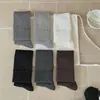 Calcetines de Nuevo Estilo Otoño Temprano 2026 para Mujer Color Sólido Avena Café Algodón Transpirable Estilo Coreano Calcetines para Mujer Calcetines de Media Pantorrilla Texturizados