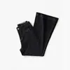 ¡Explosiones recomiendan! Diseño de nueva línea de otoño sensación cuatro lados negro Pantalones de pierna recta campana de mezclilla 571