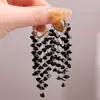 Brinco de Cristal Preto Europeu e Americano Love com Presilha de Orelha Design de Personalidade Nicho Moda Brinco Pendente Longo Elegante Acessórios de Orelha de Alta Qualidade para Mulheres