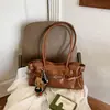 Bolso de axila de moda coreana de nicho para mujer, nuevo diseño transfronterizo, bolso de hombro plisado versátil, bolso tote de alta calidad