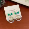 Pendientes Navideños Transfronterizos de Muñeco de Nieve Papá Noel Lazo para Mujer Aguja de Plata Exquisitos Divertidos Pendientes de Dibujos Animados Venta al por Mayor