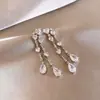 Pendientes de Borla de Perla de Circonita de Aguja Plateada Pendientes Largos de Mariposa de Lujo Accesible Francés Pendientes de Diseño Versátil para Mujer