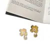 Pendientes de Flor de Metal con Textura de Lujo Ligero para Mujer Diseño de Nicho Exquisitos Versátiles para el Trabajo Pendientes Pendientes