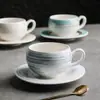 Juego de tazas de café de cerámica con forma de huevo para uso doméstico, taza de té de la tarde de capuchino simple para latte art de lujo ligero