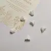 Cuentas de acrílico con acabado lechoso de flor de lirio del valle con agujero recto al por mayor, materiales y accesorios para cadenas de teléfono y llaveros DIY