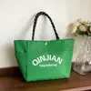 Bolso de Mano de Moda y Estilo 2026 Primavera Nuevo Bolso Tote de Gran Capacidad Personalizado Casual Simple para Mujer