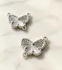 Nuevo colgante grabado en CNC para pulsera o collar DIY, doble colgante de mariposa y estrella con retención de color