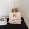 Mochila fofa de urso estilo coreano transfronteiriça para mulheres, adequada para o trajeto diário, pequena mochila de viagem simples