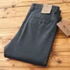 Estilo popular continúa otoño e invierno nueva textura sarga elástica pantalones largos de negocios de alta gama rectos versátiles pantalones casuales para hombre