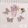 Nuevo arte de uñas mariposa de hielo transparente de red roja joyería de aleación nuevo pequeño cristal tridimensional mariposa de hielo transparente joyería al por mayor