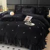 Conjunto de cama de inverno de quatro peças estilo Hepburn retrô francês, grau A, em veludo de leite, incluindo uma capa de edredom de fleece de coral, lençol de cama e outros itens de cama