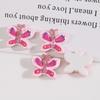 Partículas brillantes volando bailan parche de resina de mariposa rosa pendientes de clip para oreja joyería DIY femenina accesorios al por mayor