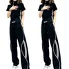 Conjunto de moda callejera para mujer, estilo coreano moderno, conjunto de dos piezas casual deportivo de alta gama con pantalones anchos de manga corta