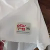 2026 Nova Camiseta de Manga Curta Estilo Coreano Retrô Street Style com Estampa de Letras Inglesas para Mulheres com Letras Grandes Gola Redonda Top de Manga Curta
