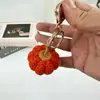 Novo Chaveiro Criativo Feito à Mão de Abóbora Pingente de Fruta Produto Acabado Tricotado em Lã Pronto para Presente de Halloween