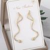 Pendientes calientes transfronterizos del distrito de Lu, chapados en cobre color oro real, pendientes de animal serpiente de personalidad, ventas directas de fábrica al por mayor
