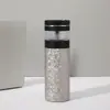 Taza aislada de titanio puro de doble capa, para uso doméstico, con diseño de separación de té y agua, una taza de titanio de alta gama adecuada para entornos de negocios, empaquetada como juego de regalo, una taza de titanio lujosa para regalos de negocios