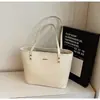 Moda Transfronteriza Viaje Diario Gran Capacidad Verano 2026 Nuevo Retro Simple Personalizado Casual Bolso de Mano Bolso al Hombro para Mujer