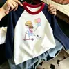 Camiseta de Manga Longa para Meninas 2026 Nova Moda Primavera e Outono Top Básico de Algodão Puro Manga Raglã Tendência
