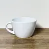Taza de Cerámica con Asa de Color Sólido de Aspecto de Alta Gama para el Hogar Taza de Agua Popular con Estampado de Graffiti Taza de Leche Café