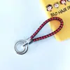 Chaveiro de corda trançada com anel duplo chaveiro de couro PU colorido novo pingente para bolsa feminina chaveiro para pendurar na cintura
