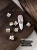 Perla Flor Blanca Pequeña Pedrería Decoraciones para Uñas Ovaladas Ojo de Caballo Pequeño Aleación de Perla Pedrería para Uñas Hecha a Mano Venta al por Mayor