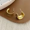 Aretes vintage de gota esmaltada roja con círculo, temperamento femenino, diseño único, aretes en forma de C, sentido de alta gama, aretes de año nuevo
