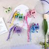 Creativo lindo nudo de cuerda de bola de pelo pequeño elementos de campana pequeña cadena de cuerda para llavero combinable cadena decorativa adornos colgantes para mochila escolar de hombres y mujeres