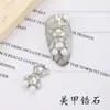 Accesorios para Uñas de Arte para Uñas Nuevas Transfronterizos Cara Sonriente Hueca Oso de Dibujos Animados Color de Lujo Ligero que Conserva el Color Flor de Perla Decoración para Uñas Venta al por Mayor