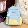 Mochila fresca de cuadros estilo japonés para niñas, gran capacidad, adecuada para estudiantes de secundaria, preparatoria y universidad, con bloques de color, bolsa escolar casual versátil