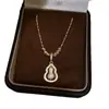 Colgante de Calabaza con Goteo de Aceite de Zirconia Chapado en Oro Real de 18k Collar de Doble Cara Cadena para Clavícula de Lujo Ligero Sensación de Alta Gama Accesorio de Collar de Nicho