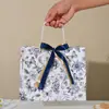 Sacolas de presente transfronteiriças com estampas florais e fitas, sacolas de embalagem de alta qualidade, sacolas de presente para feriados, bolsas de mão, sacolas de embalagem para roupas