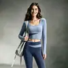 Conjunto de Yoga e Fitness Feminino de Manga Longa com Sutiã Embutido Gola Redonda Calça Esportiva Casual Anti-Exposição Conjunto de Duas Peças para Corrida