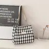 Bolsa grande de lã para mulheres 2024 outono e inverno Nova bolsa de mão da moda para estudantes bolsa de ombro tote versátil de grande capacidade xadrez