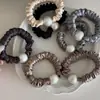 Círculo Intestinal de Perla de Alta Textura Combinación Perfecta Alta Elasticidad Clásico Adorno para la Cabeza de Mujer Elegante Elegante Tejido Suave Sin Pelo de Conejo Anillo para el Cabello
