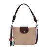 Bolso de hombro vintage de gamuza modelo nuevo 2026, bolso cruzado versátil de nicho para el día a día con correa de hombro de cuerda trenzada, bolso de axila con sensación de alta gama