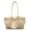Bolsa Tote com Laço de Nicho Feminina 2026 Cor Sólida Estilo Coreano Moda Versátil Toque de Luxo Dobrada Ombro Único Bolsa de Axila